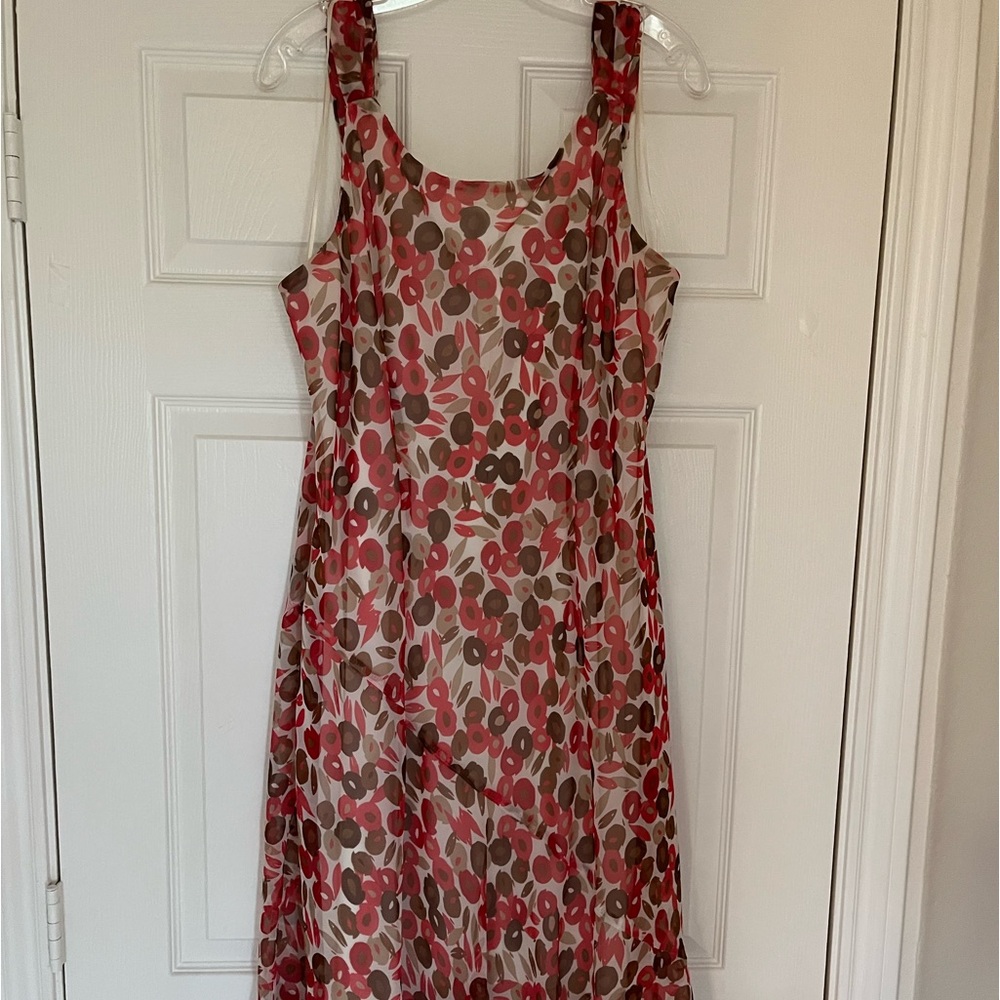 Cool,  flirty, flippy, dress. Beautiful colors in this multi layered dress.